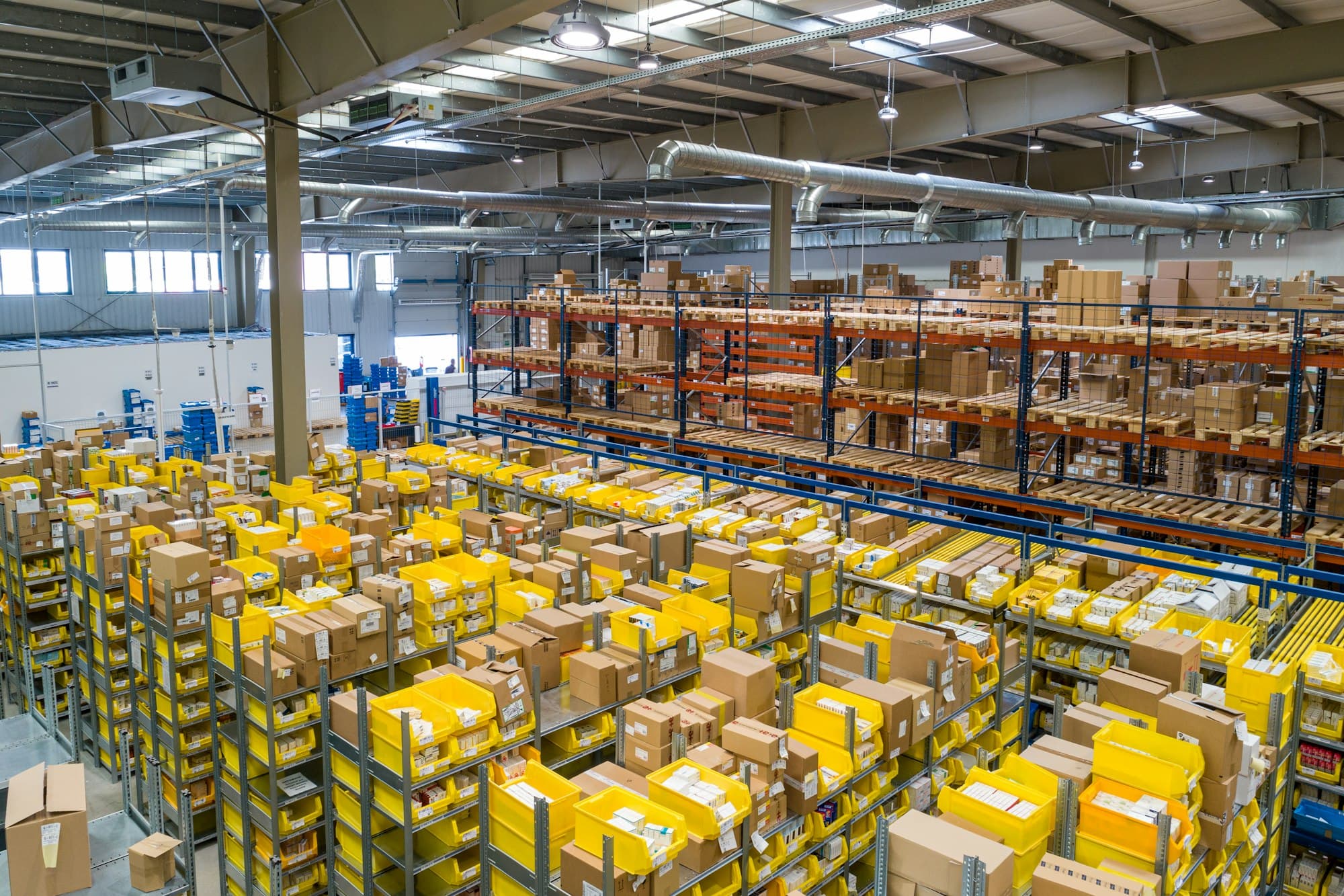 Parts storage with bins and racking in a distribution operation